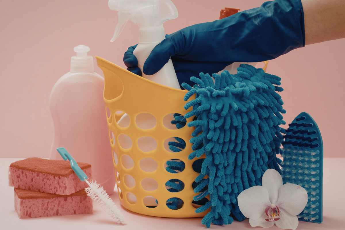 Kitchen cleaning supplies in a bucket
