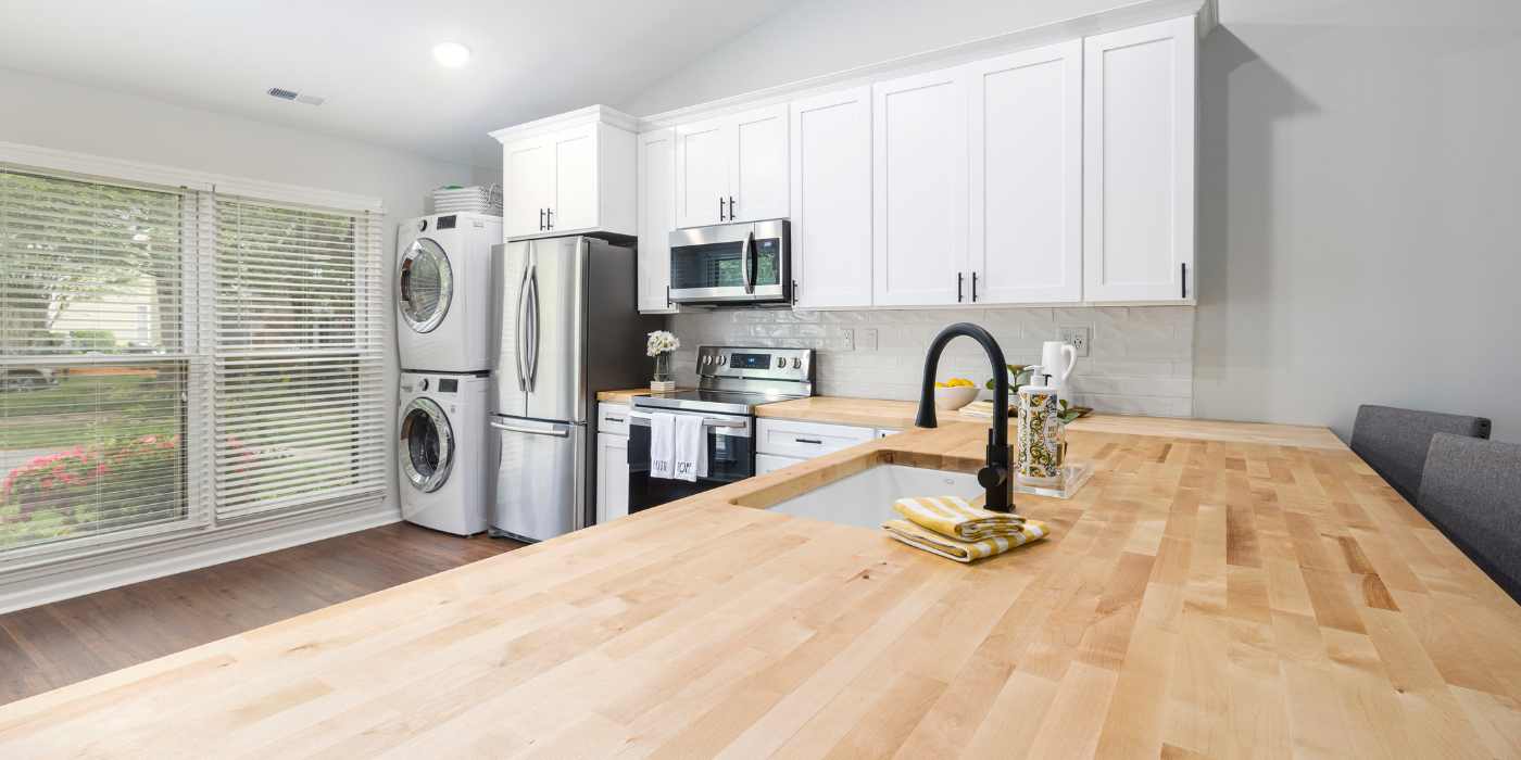 Clean kitchen countertop and sink after kitchen cleaning