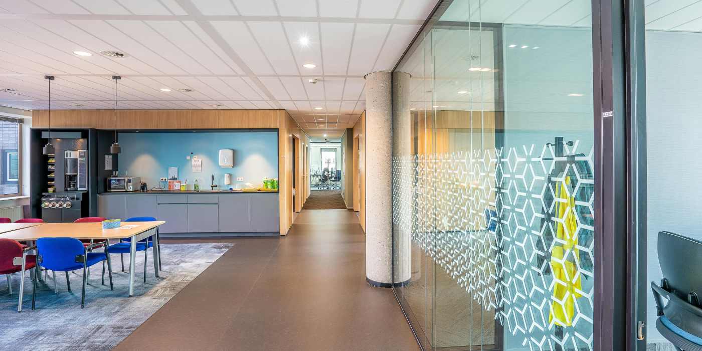 Clean modern office kitchenette after breakroom cleaning