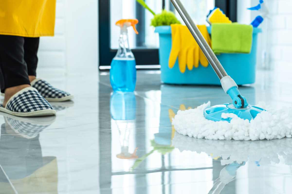 Residential floor cleaning service inside a home
